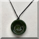 J152. Stone swirl necklace and leather cord - $28 